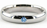 Blauwe diamant krijgt een prachtige uitstraling in een palladium ringscheen